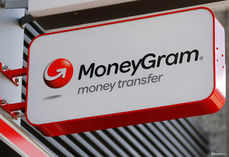 A Moneygram logo is seen outside a bank in Vienna A Moneygram logo is seen outside a bank in Vienna